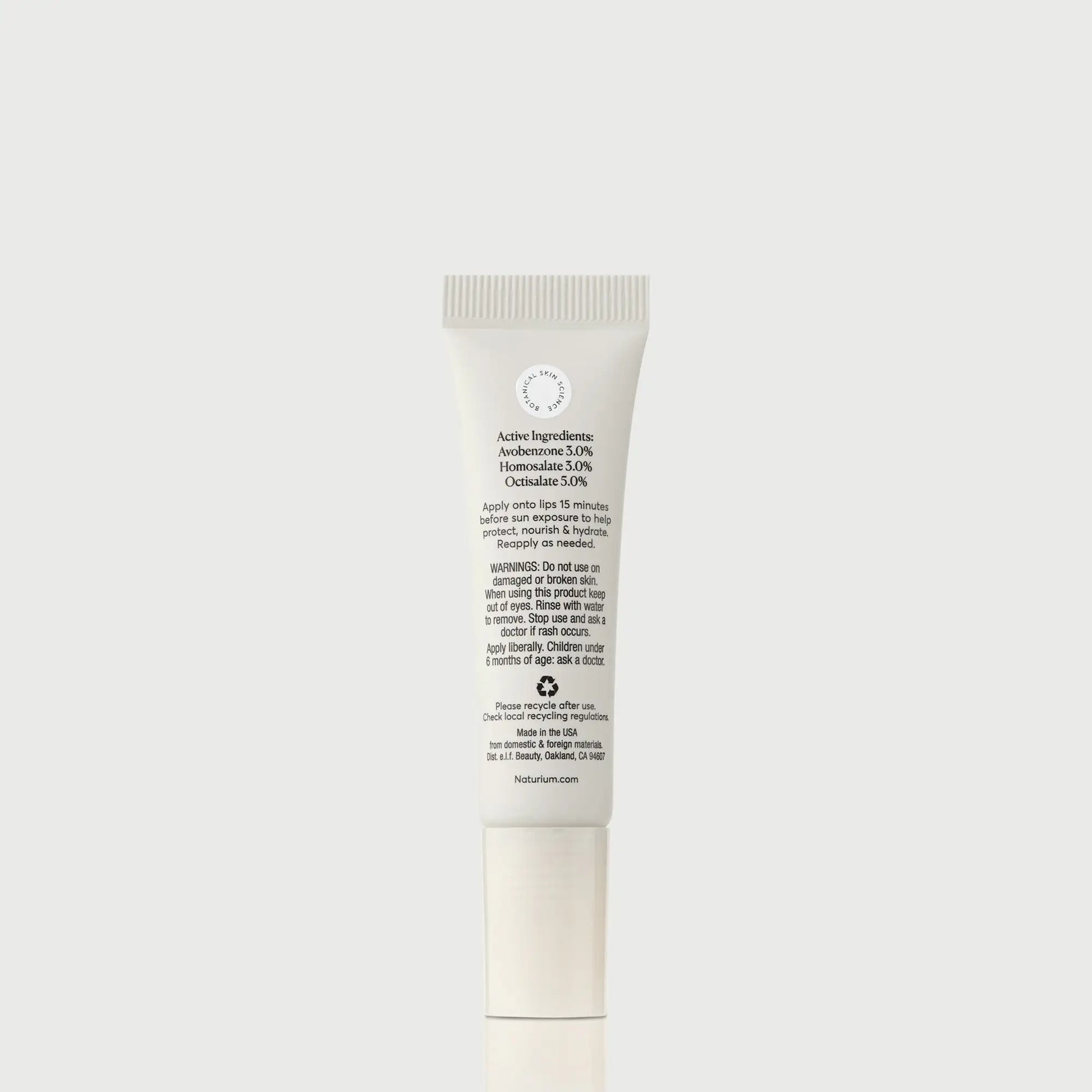 phyto-glow-lip-balm-spf-45-clear-l7 NATR-10124_PhytoGlow_SPF_Clear_primary_capon_back_bonebkgd_1.webp