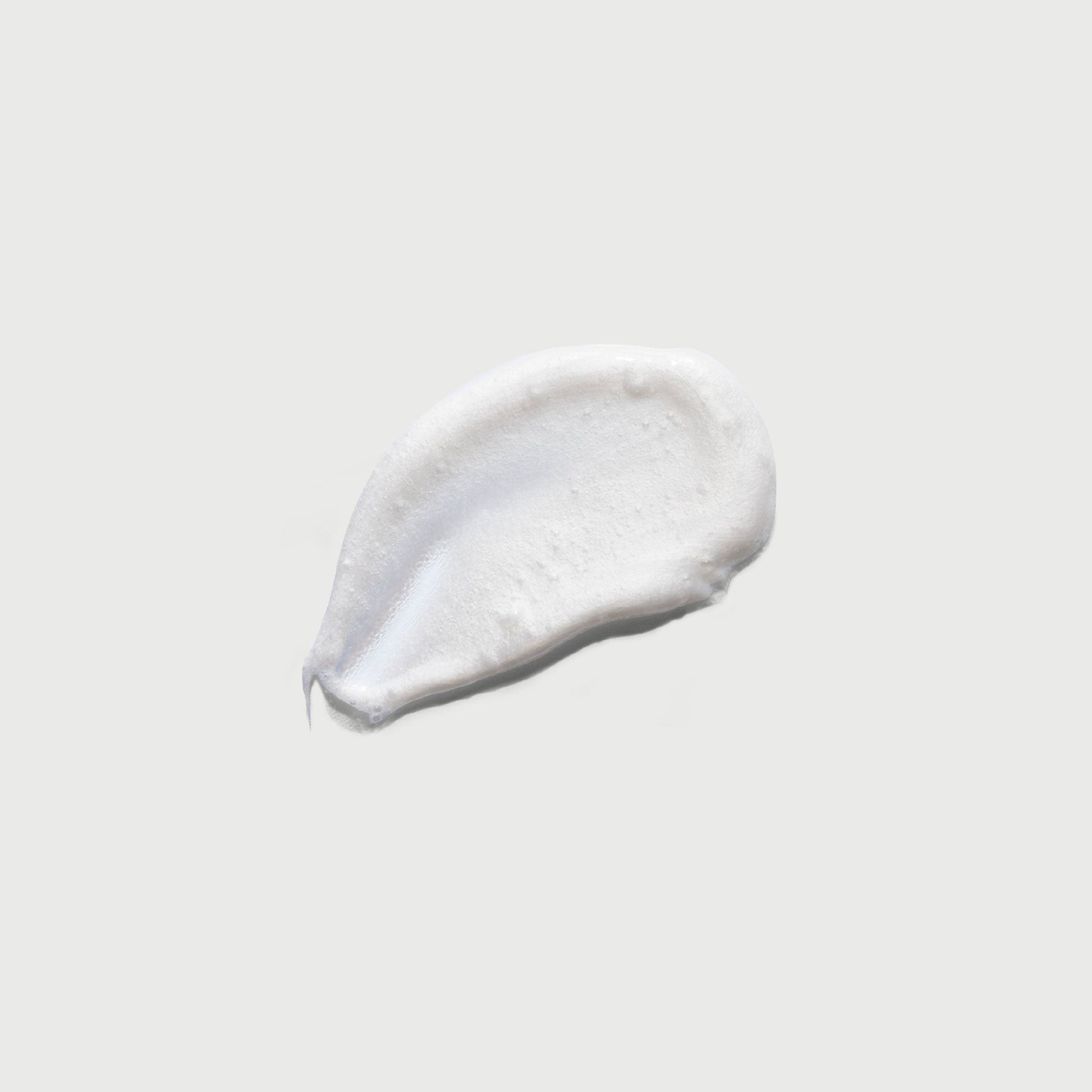 the-smoother-glycolic-acid-exfoliating-body-wash-w3 NATR-40002-Swatch-The-Smoother-Glycolic-Acid-Exfoliating-Body-Wash-bonebkgd.jpg