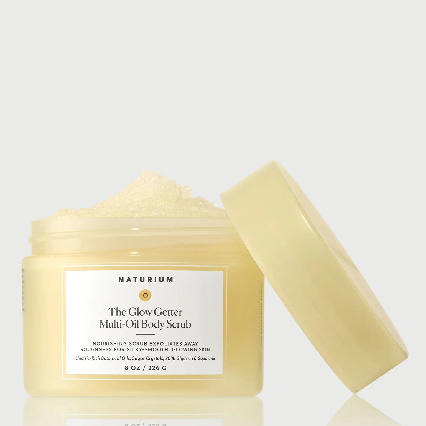 the-glow-getter-multi-oil-body-scrub-z1 NATR-40028-GlowGetter-Multi-Oil-Body-Scrub-Front-CapOff-bonebkgd.webp
