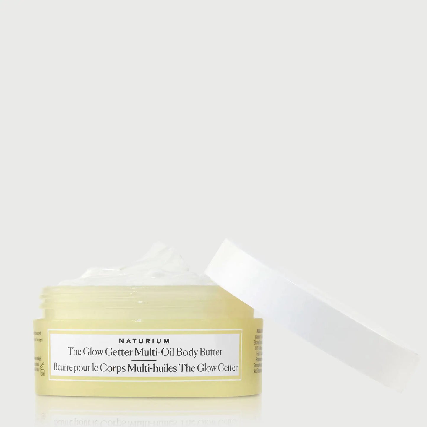 the-glow-getter-multi-oil-body-butter-travel-size-y8 NATR-40115_Glow-Getter-Body-Butter-Mini_front_capoff_bonebkgd.webp